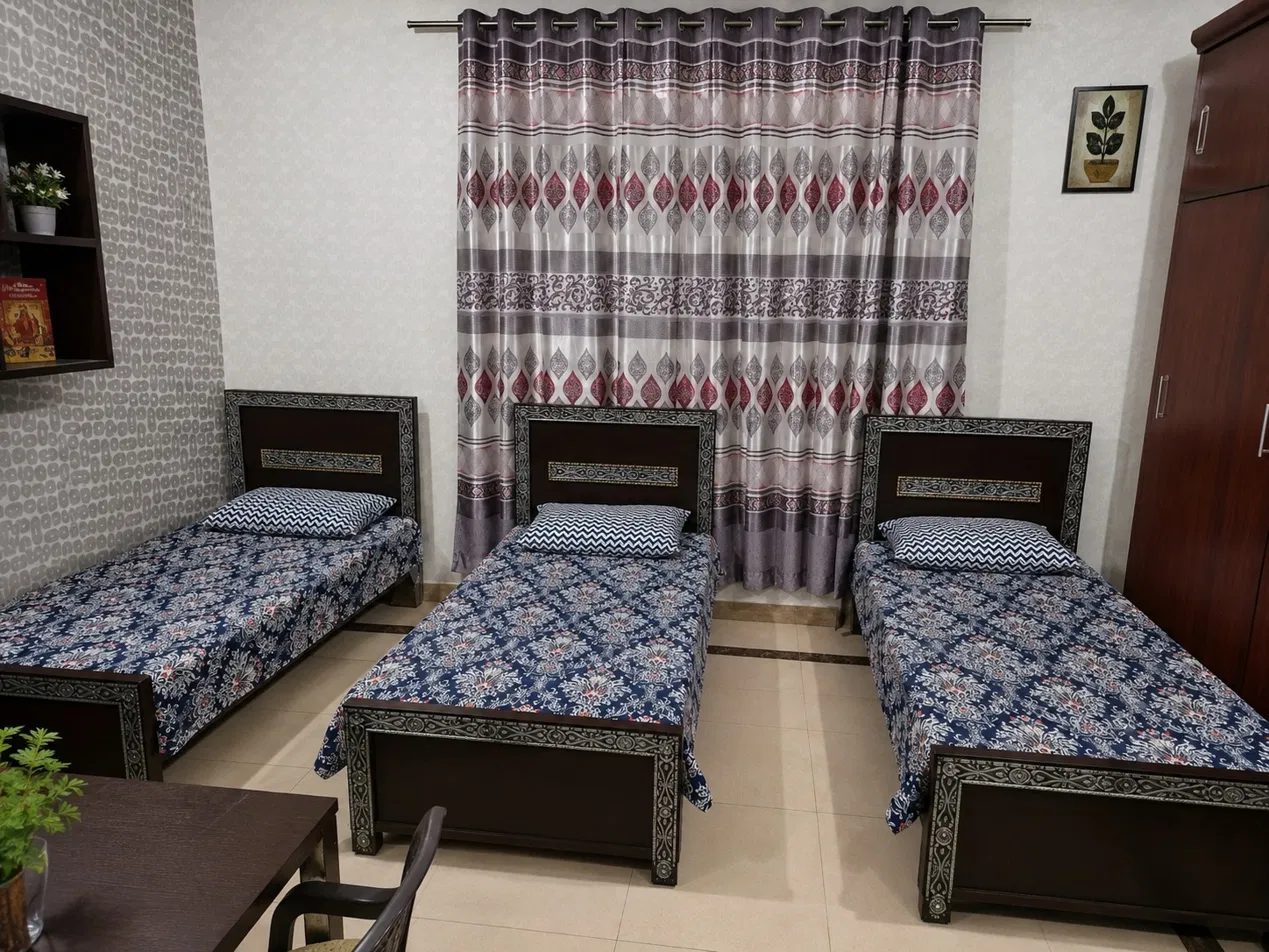 Three-person room with attached bath